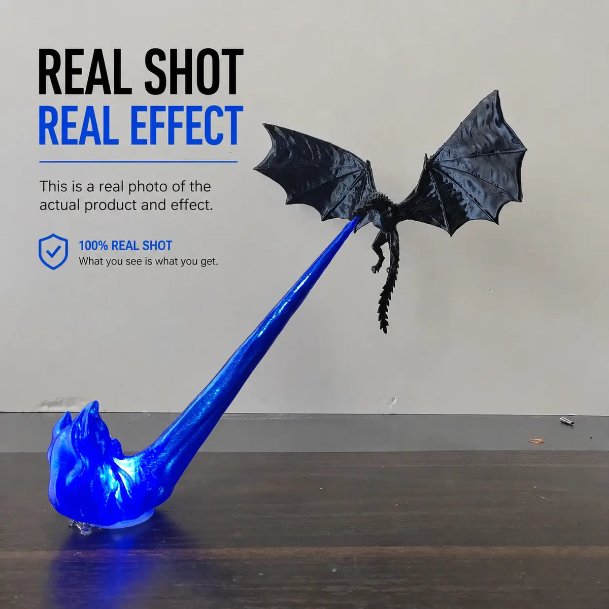 Straightforward product photo of the blue illuminated dragon decoration
