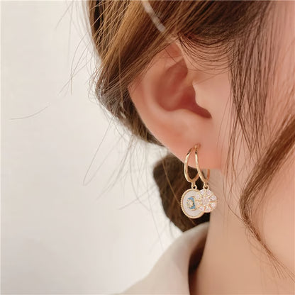💎 Sparkling Natural Shell Zircon Earrings – Elegant & Lightweight